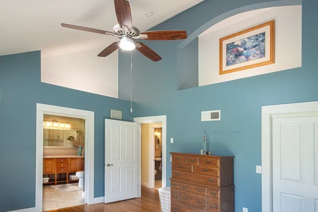 a view of a hallway with a bedroom
