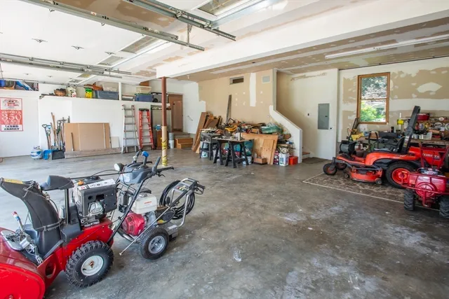 a view of a garage with furniture