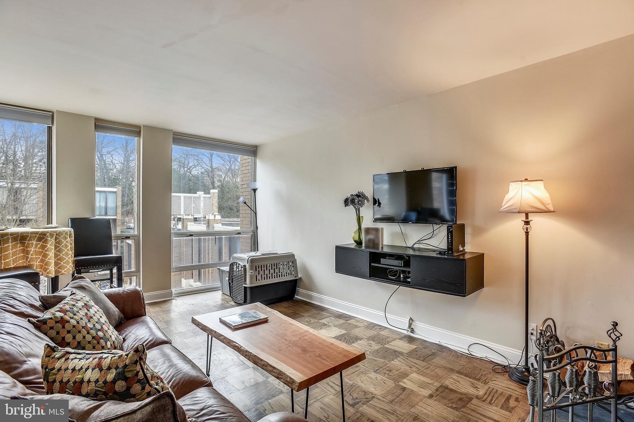 1606 Chimney House Road Reston, VA 20190 - Photo 7 of 47 Living Room with floor to ceiling windows