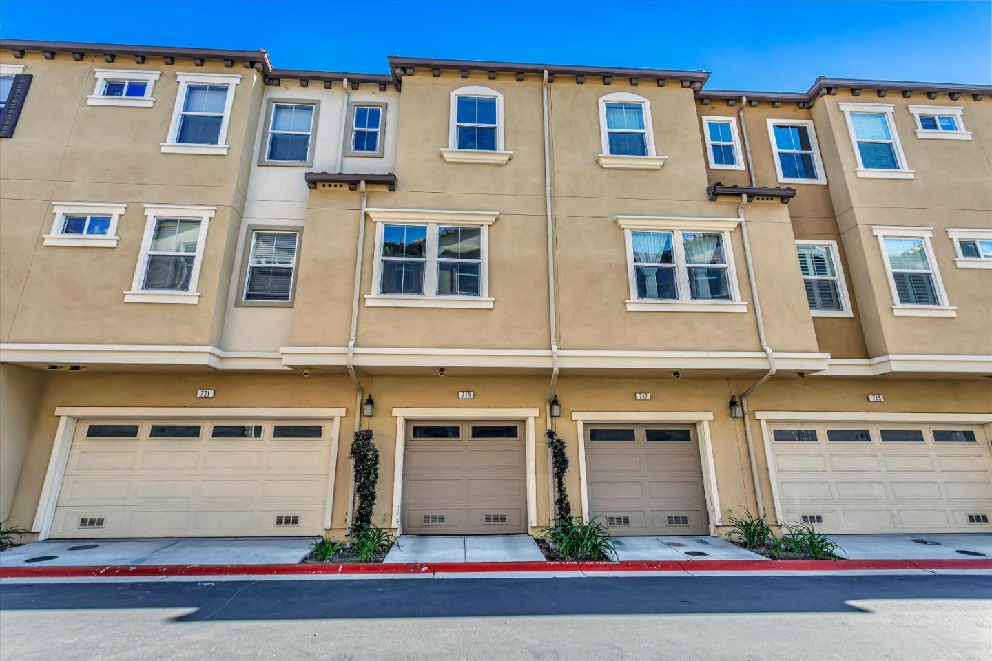 1367 Merry Loop Milpitas, CA 95035 - Photo 6 of 12 a front view of multi story residential apartment building