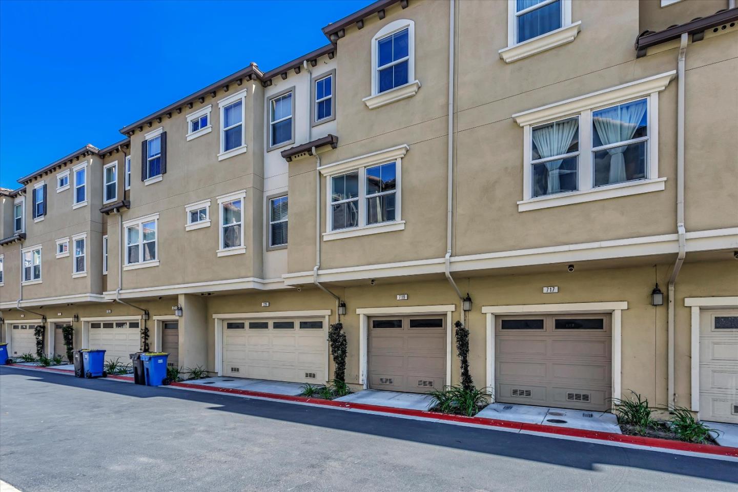1367 Merry Loop Milpitas, CA 95035 - Photo 7 of 12 a front view of a building with street