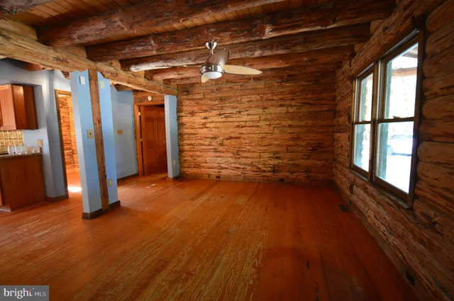 a view of entryway with wooden floor