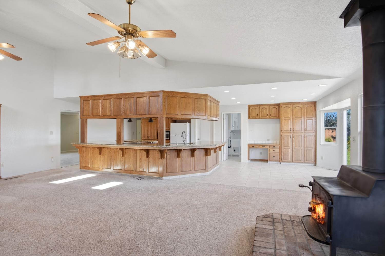 16166 Lawrence Road Escalon, CA 95320 - Photo 15 of 56 a living room with furniture and a chandelier