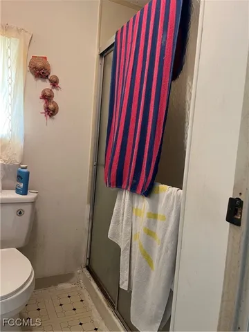 a bathroom with a sink and toilet