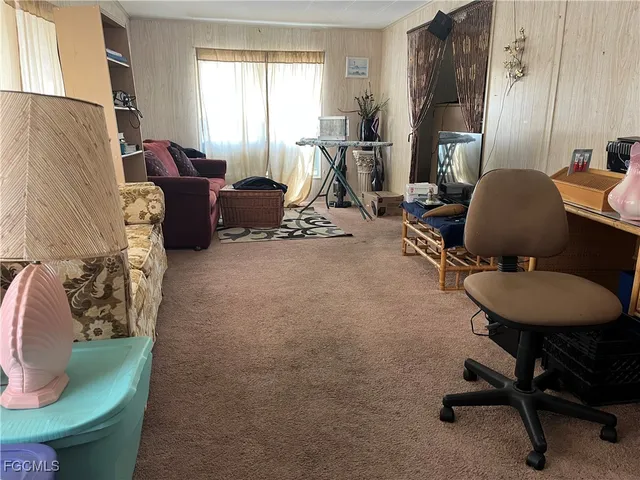 a room with furniture and windows