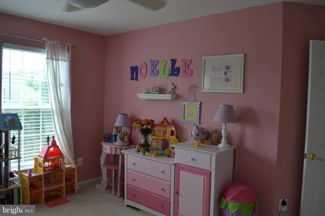 a room with furniture and a window