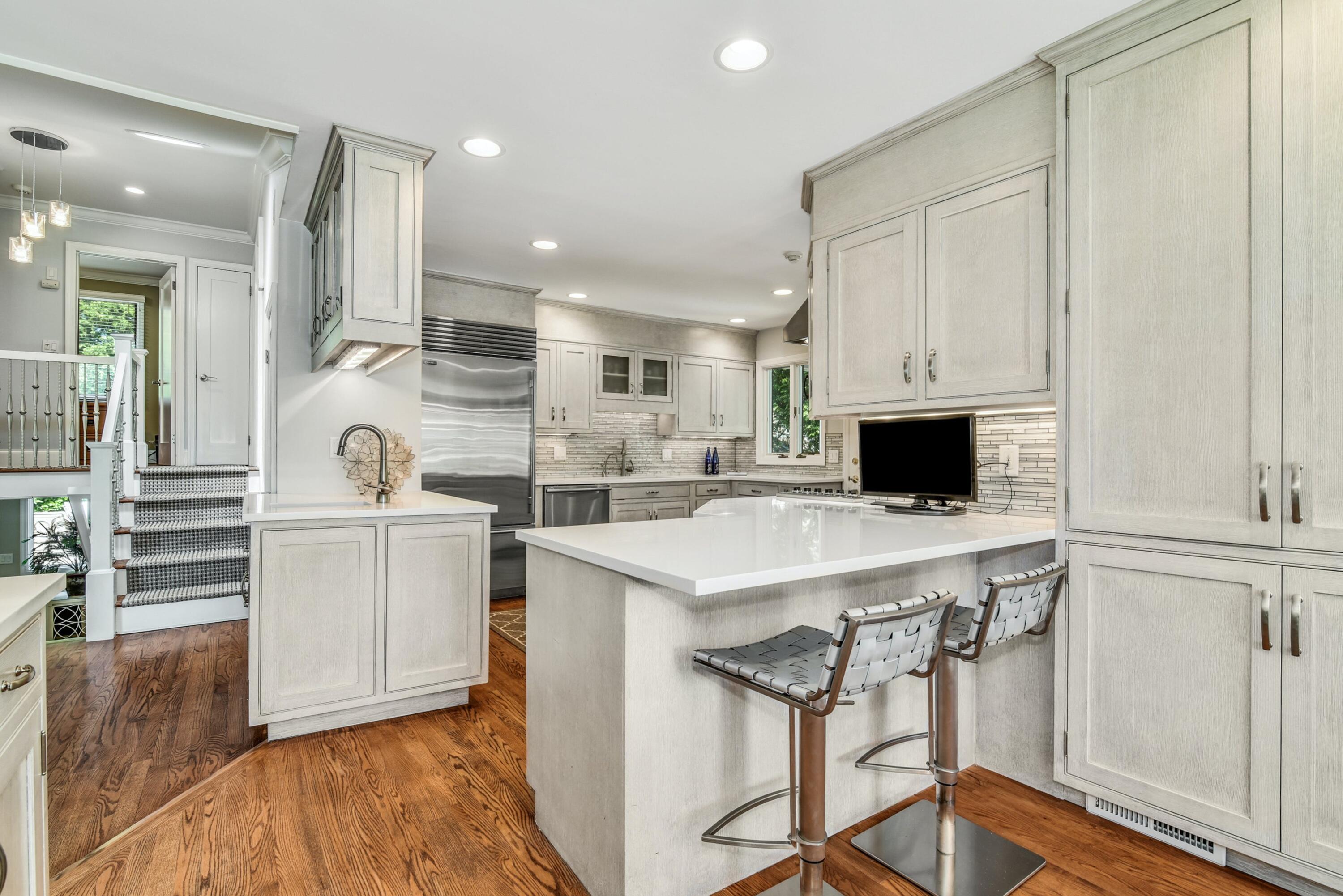 9 Top Sail Road Rowayton, CT 06853 - Photo 12 of 30 a kitchen with a stove a refrigerator and a sink