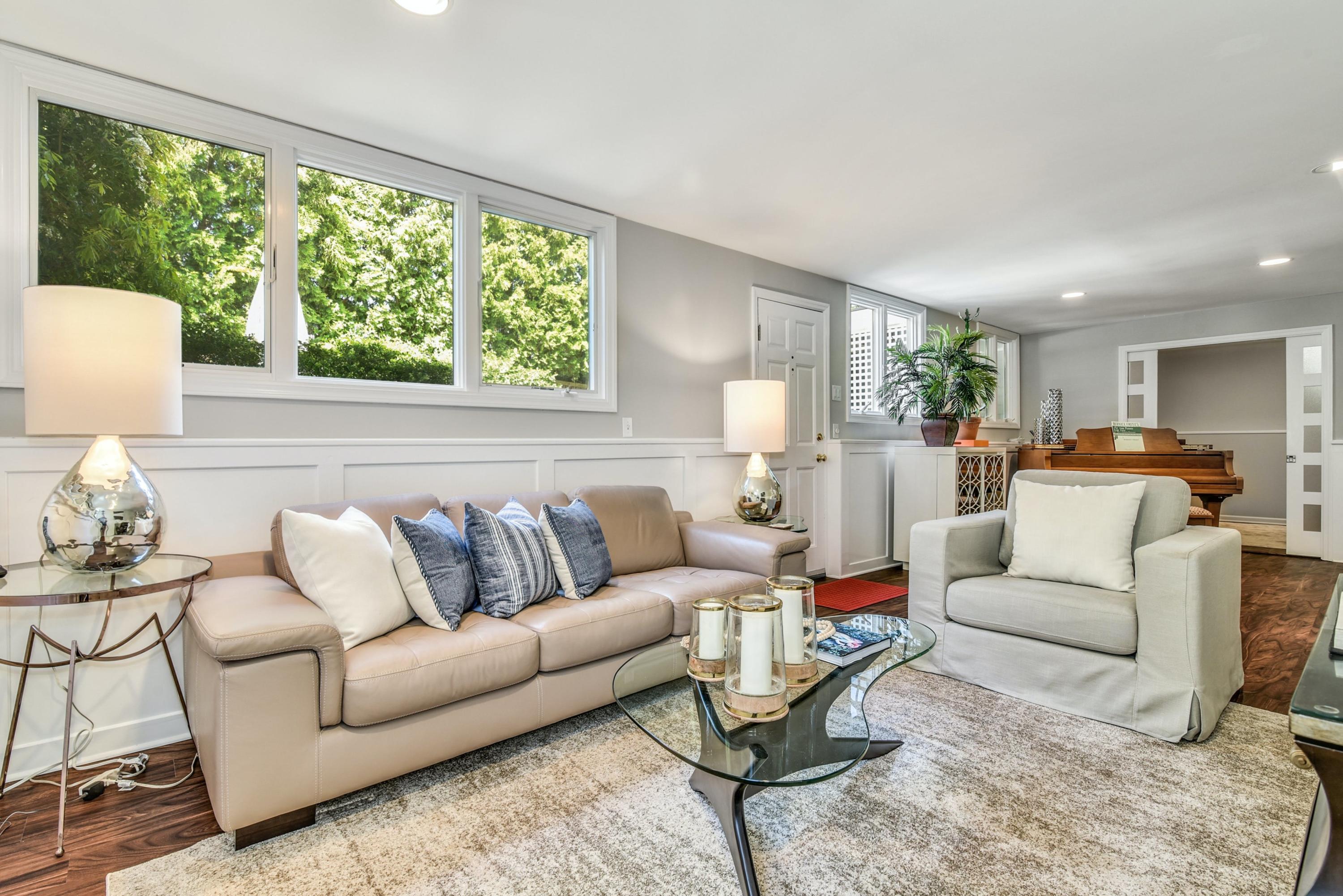 9 Top Sail Road Rowayton, CT 06853 - Photo 17 of 30 a living room with furniture and a large window