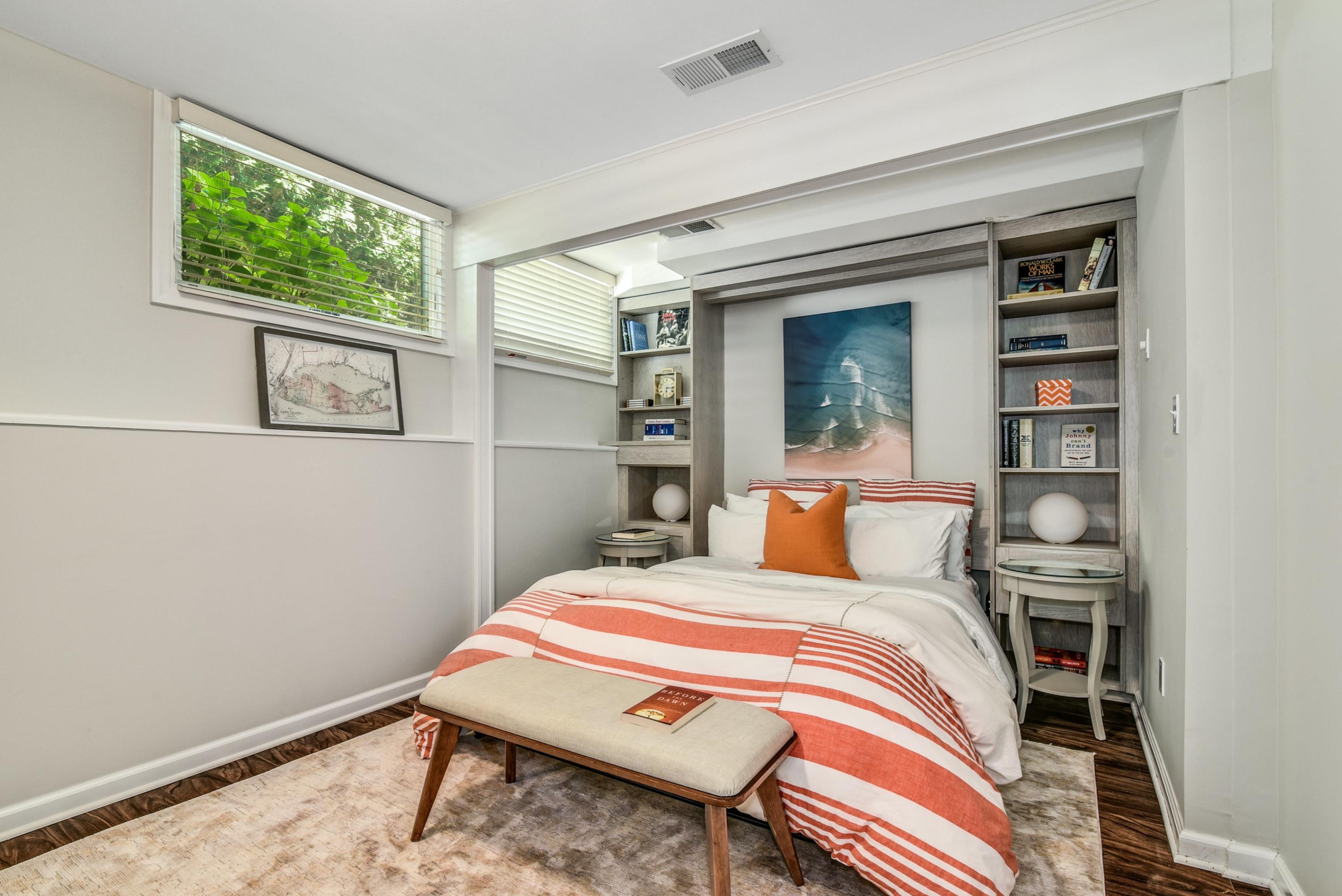 9 Top Sail Road Rowayton, CT 06853 - Photo 19 of 30 a bedroom with a bed and a window