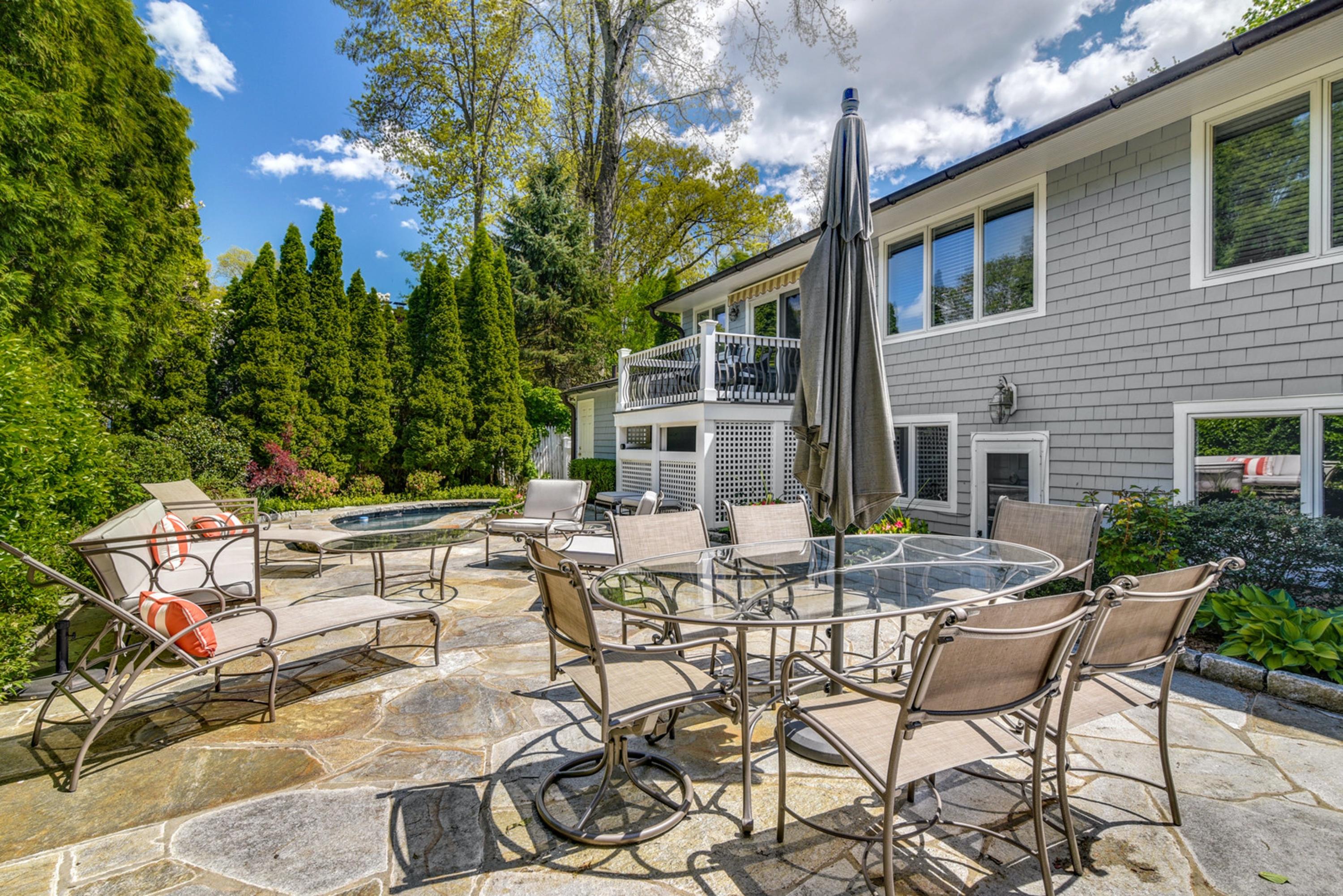 9 Top Sail Road Rowayton, CT 06853 - Photo 3 of 30 a view of a patio with couches table and chairs and potted plants