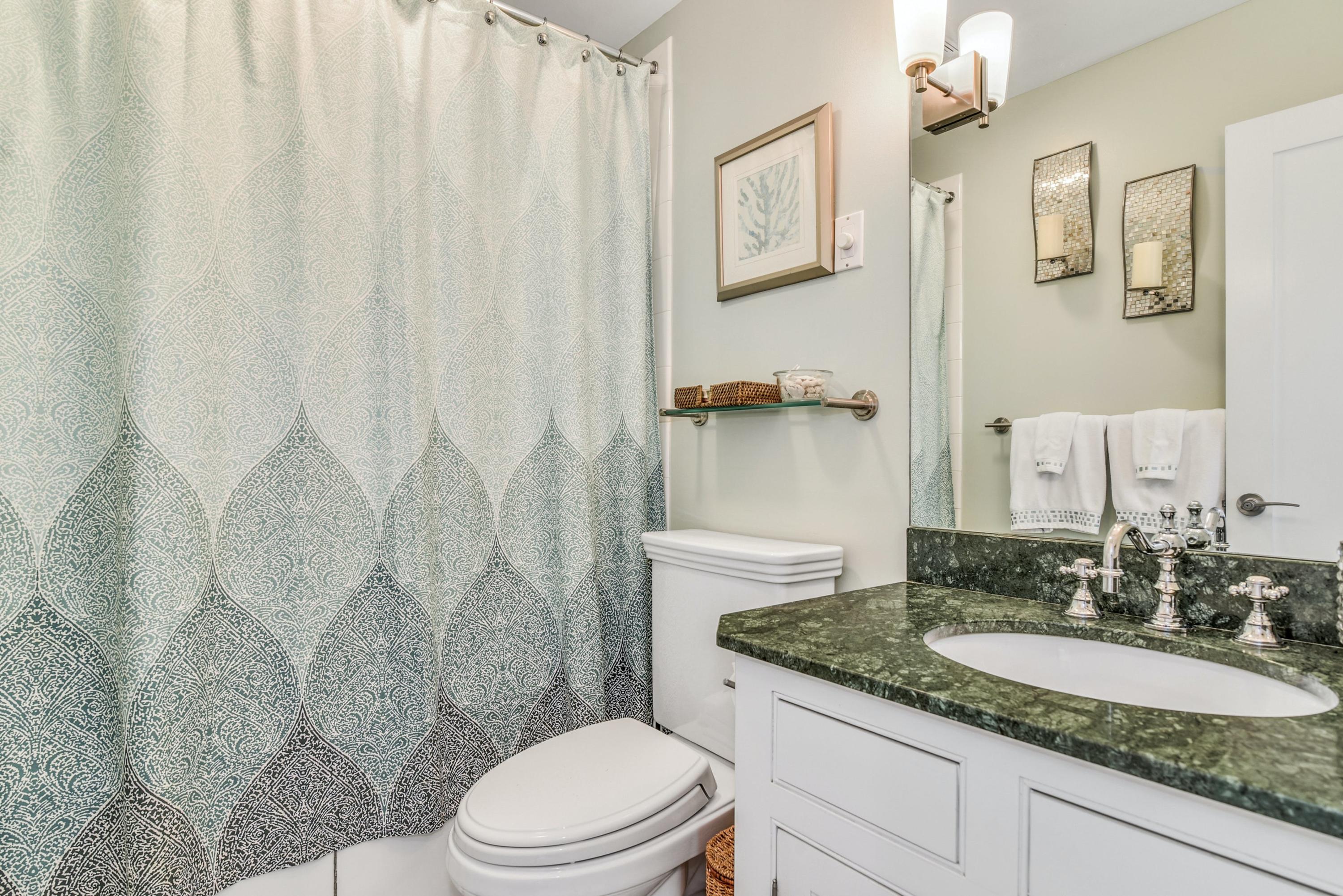 9 Top Sail Road Rowayton, CT 06853 - Photo 21 of 30 a bathroom with a granite countertop sink and a mirror