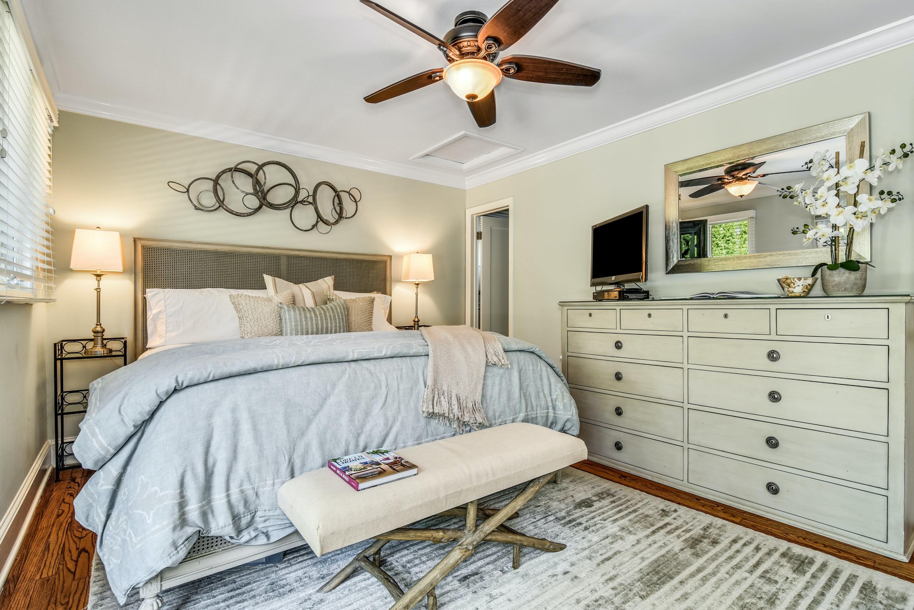 9 Top Sail Road Rowayton, CT 06853 - Photo 26 of 30 a bedroom with a bed and a flat screen tv