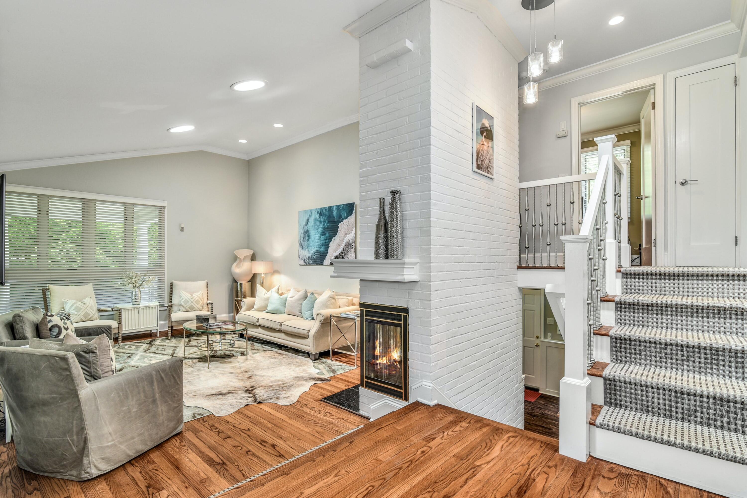 9 Top Sail Road Rowayton, CT 06853 - Photo 6 of 30 a living room with furniture and a fireplace