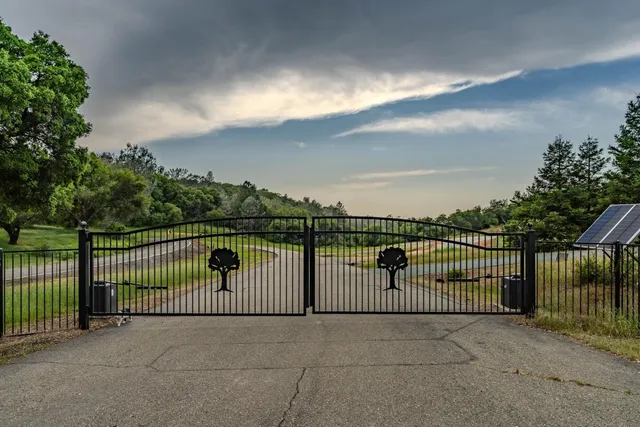 an aerial view of residential house and green space