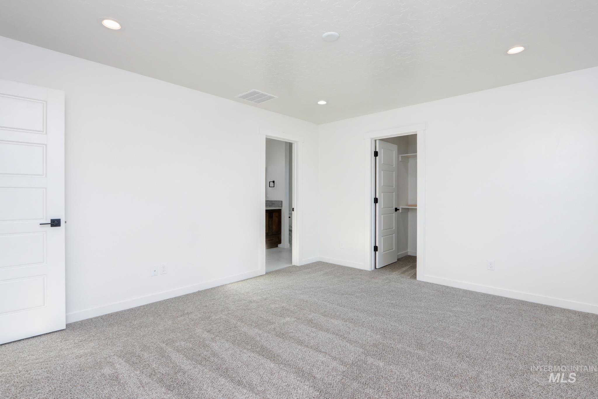 848 North 5th Street Nyssa, OR 97913 - Photo 13 of 49 Bright interior space featuring plush grey carpeting and white walls
