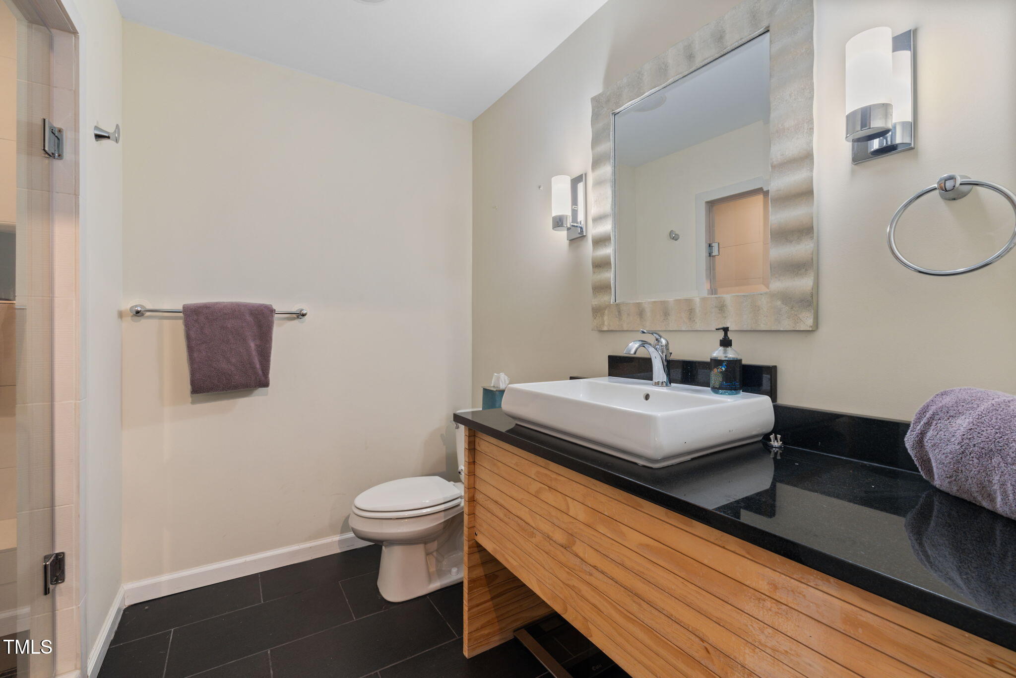 8106 Sommerwell Street Raleigh, NC 27613 - Photo 37 of 61 Full bath in basement