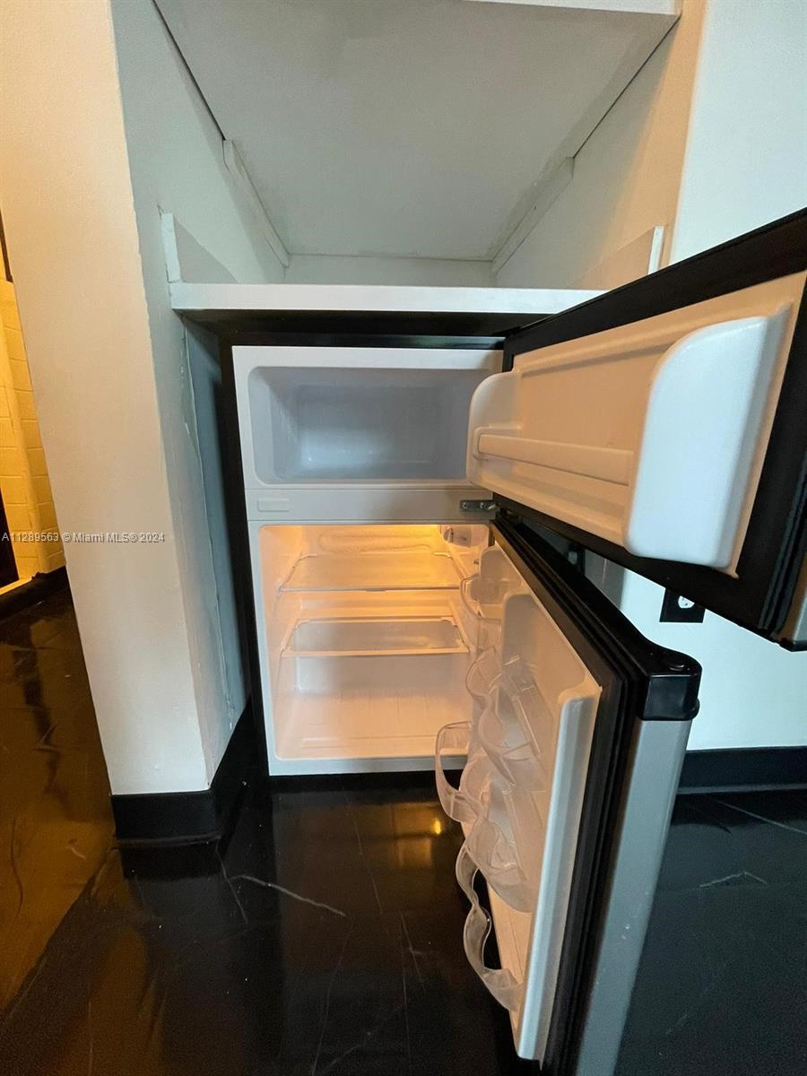 1455 Michigan Avenue, Unit 7 Miami Beach, FL 33139 - Photo 2 of 12 a view of walk in closet