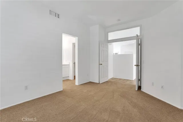 a bathroom with a sink vanity and mirror