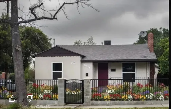 a front view of a house with a porch