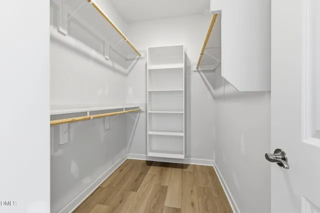 a view of an empty walk in closet