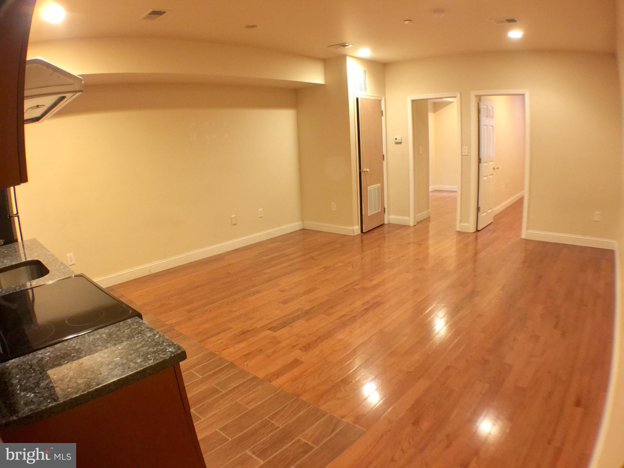 1241 Vine Street, Unit 2R Philadelphia, PA 19107 - Photo 3 of 7 a view of an empty room and window
