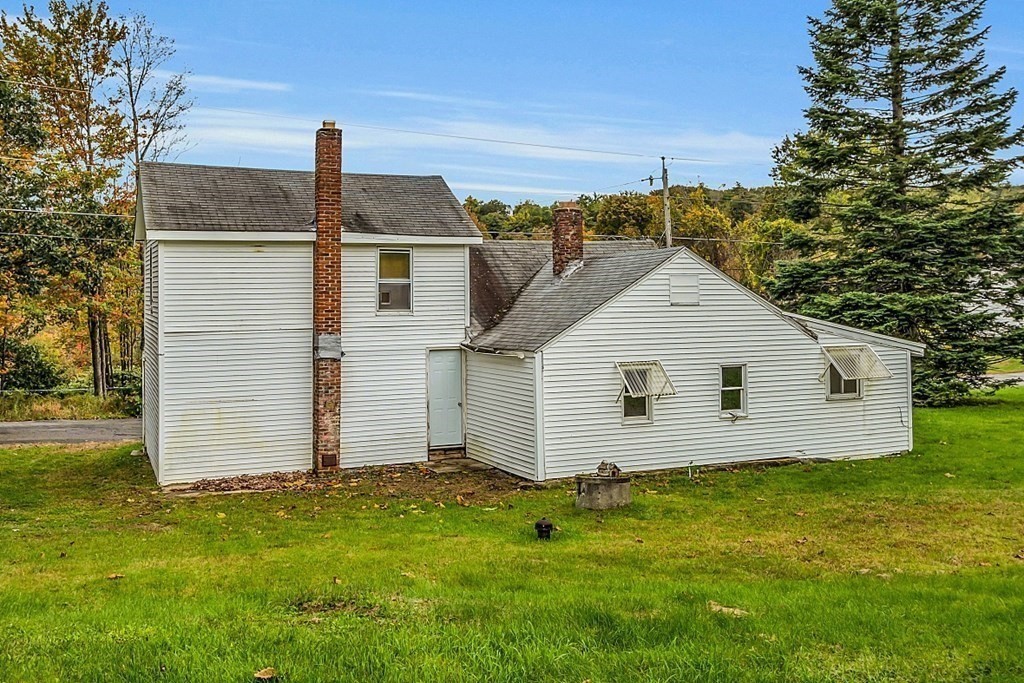 369 Old Northfield Road Ashby, MA 01431 - Photo 19 of 24 a view of a house with a yard