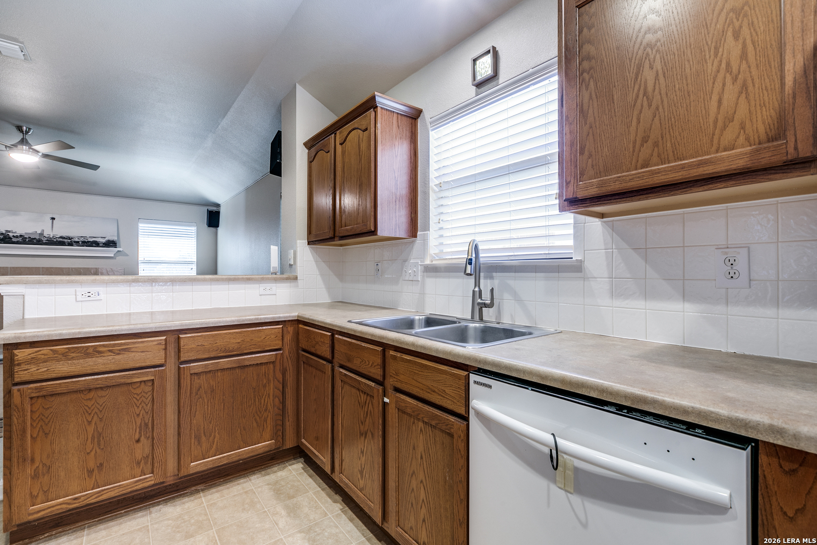 6822 Freedom Ridge San Antonio, TX 78242 - Photo 12 of 25 a kitchen with a sink and cabinets