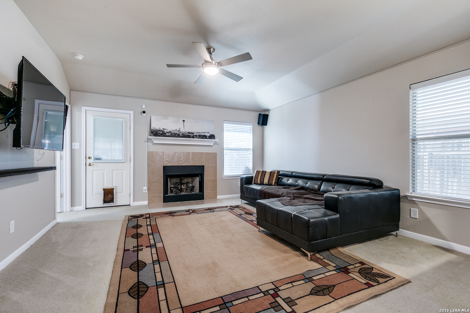 6822 Freedom Ridge San Antonio, TX 78242 - Photo 7 of 25 a living room with furniture and a fireplace