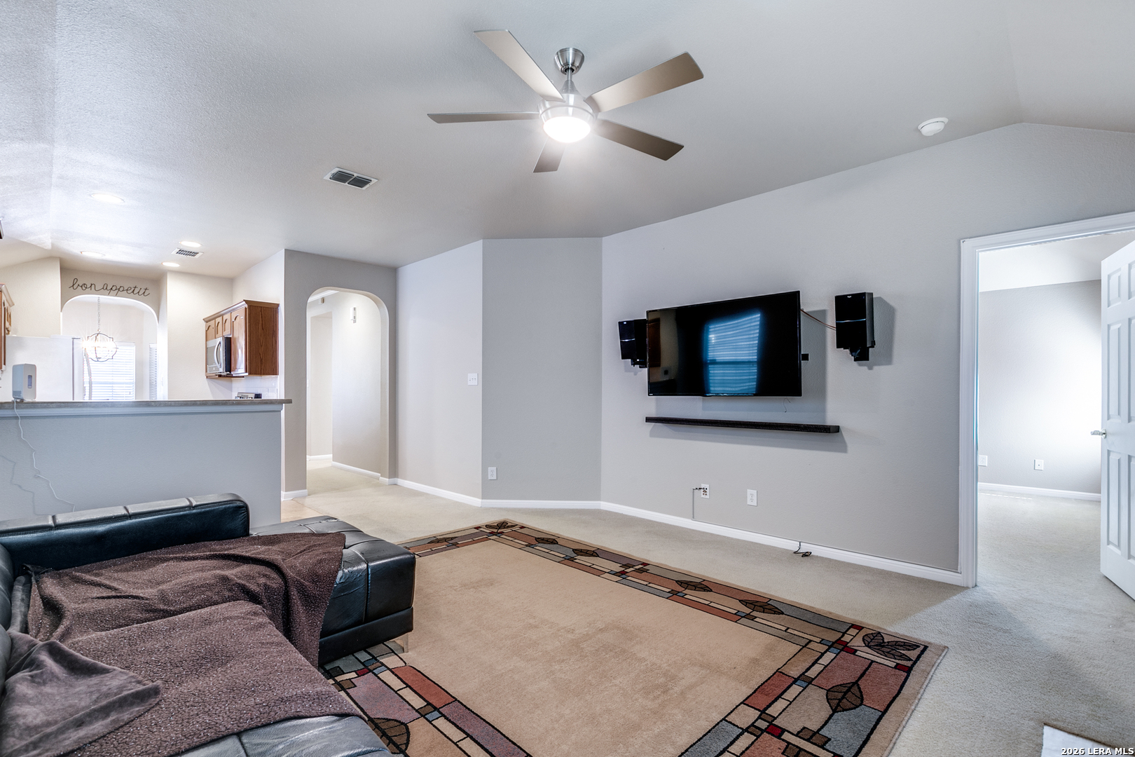 6822 Freedom Ridge San Antonio, TX 78242 - Photo 9 of 25 a living room with furniture and a flat screen tv