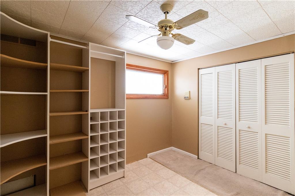 3380 Ridgway Street Pittsburgh, PA 15213 - Photo 13 of 25 Second bedroom, located on the upper level (above the family room). Window looks out onto the backyard. This bedroom is currently outfitted for use as a large walk-in closet/dressing room.