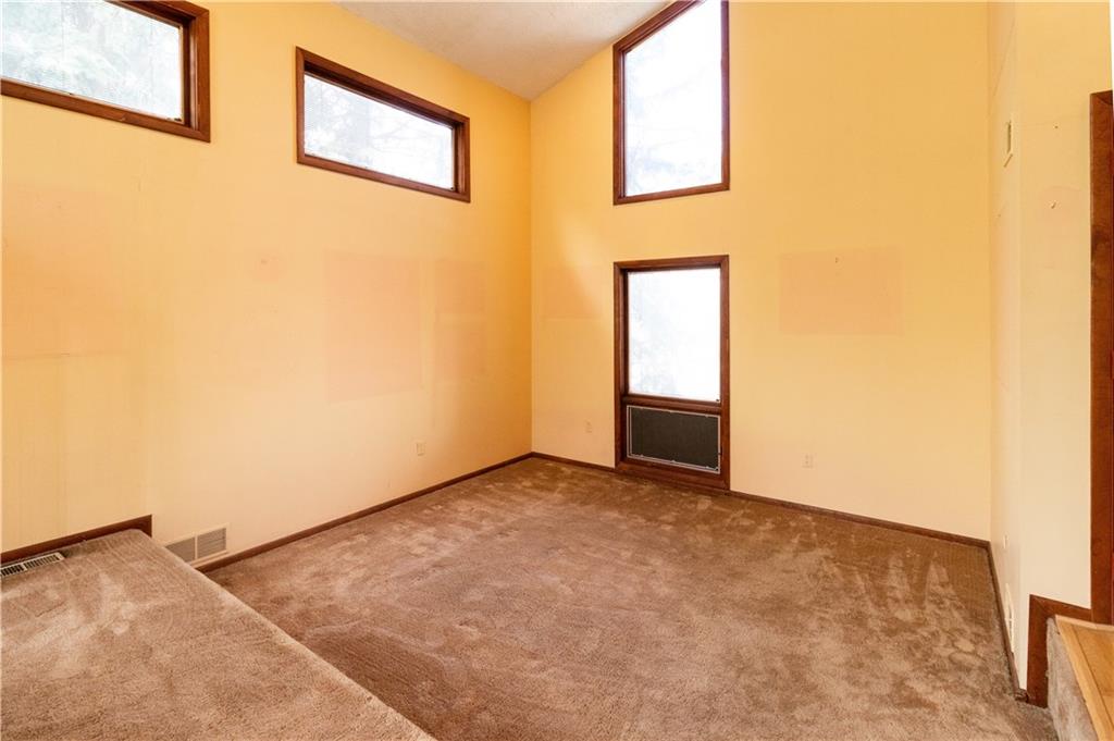 3380 Ridgway Street Pittsburgh, PA 15213 - Photo 9 of 25 Full view of the living room. Windows look out onto the front yard and Ridgeway Street.