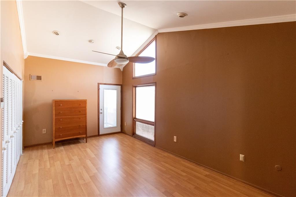 3380 Ridgway Street Pittsburgh, PA 15213 - Photo 10 of 25 Master bedroom as viewed from hallway to master bath/dressing room. Window looks out onto Ridgeway Street; door opens onto 12'x6' covered terrace. This room is located on the upper level, to the front of the house.