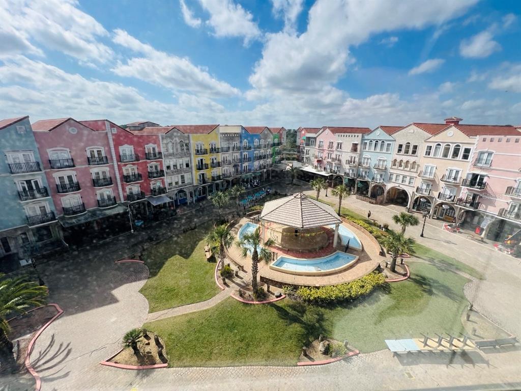 a view of a swimming pool with sitting area