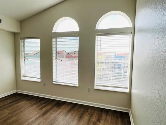 a view of a room that has a window