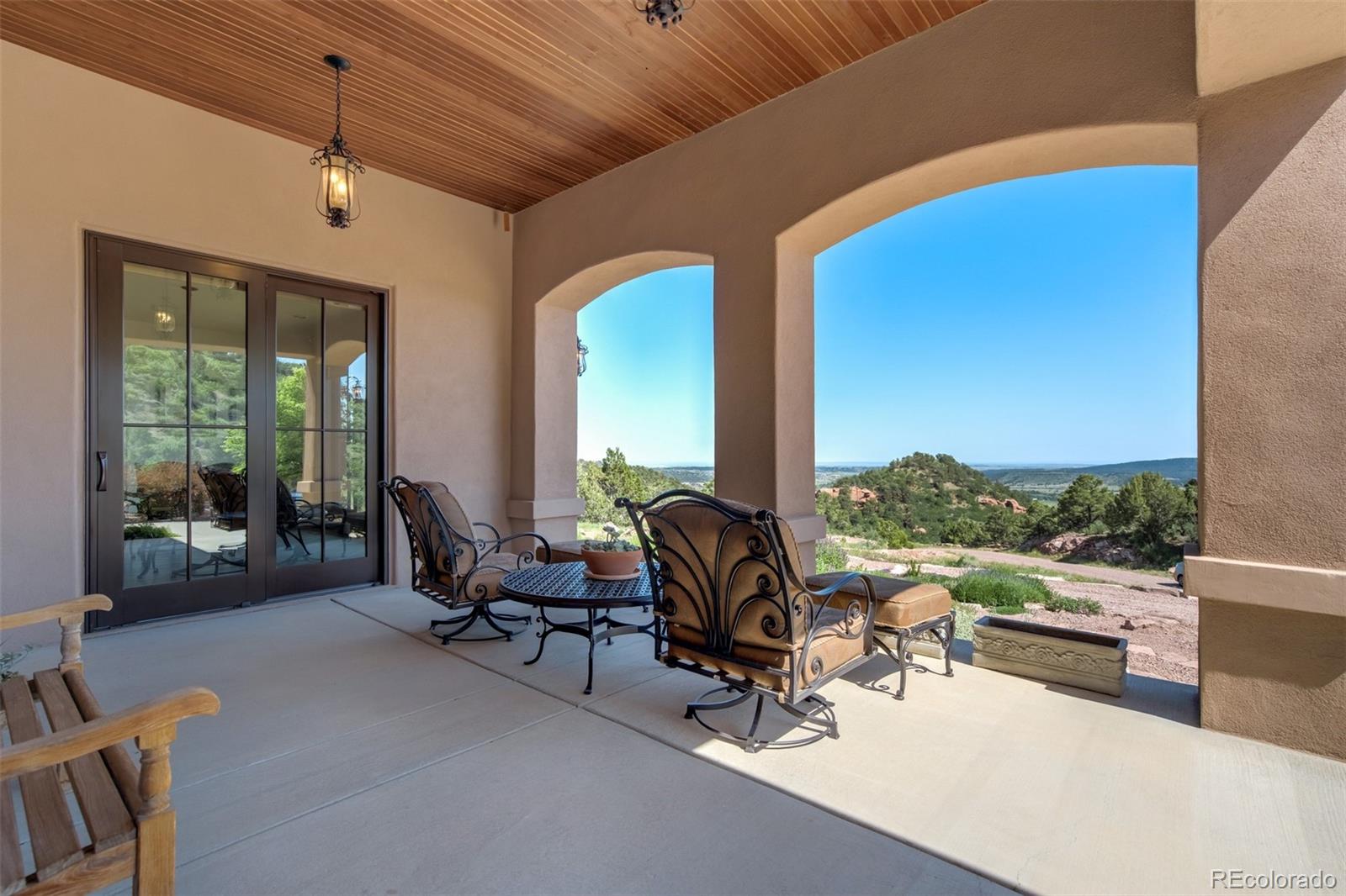 14250 Aiken Ride View Colorado Springs, CO 80926 - Photo 46 of 50 a living room with furniture