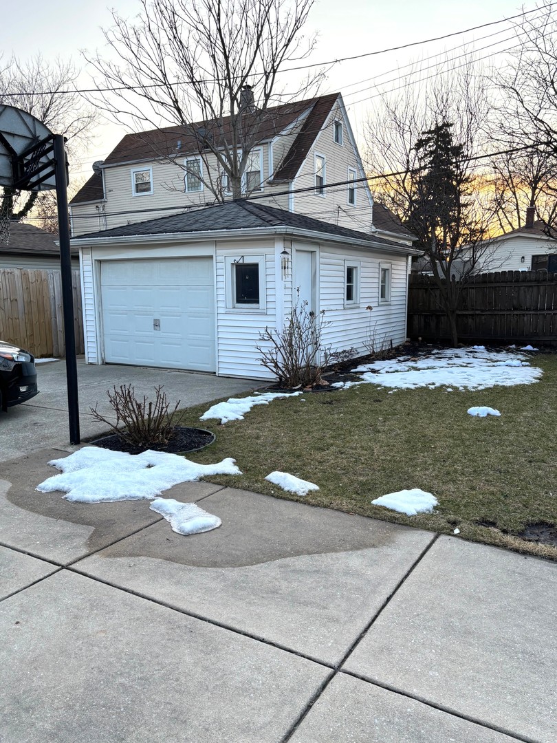 10312 South Spaulding Avenue Chicago, IL 60655 - Photo 4 of 5 a view of a house with backyard