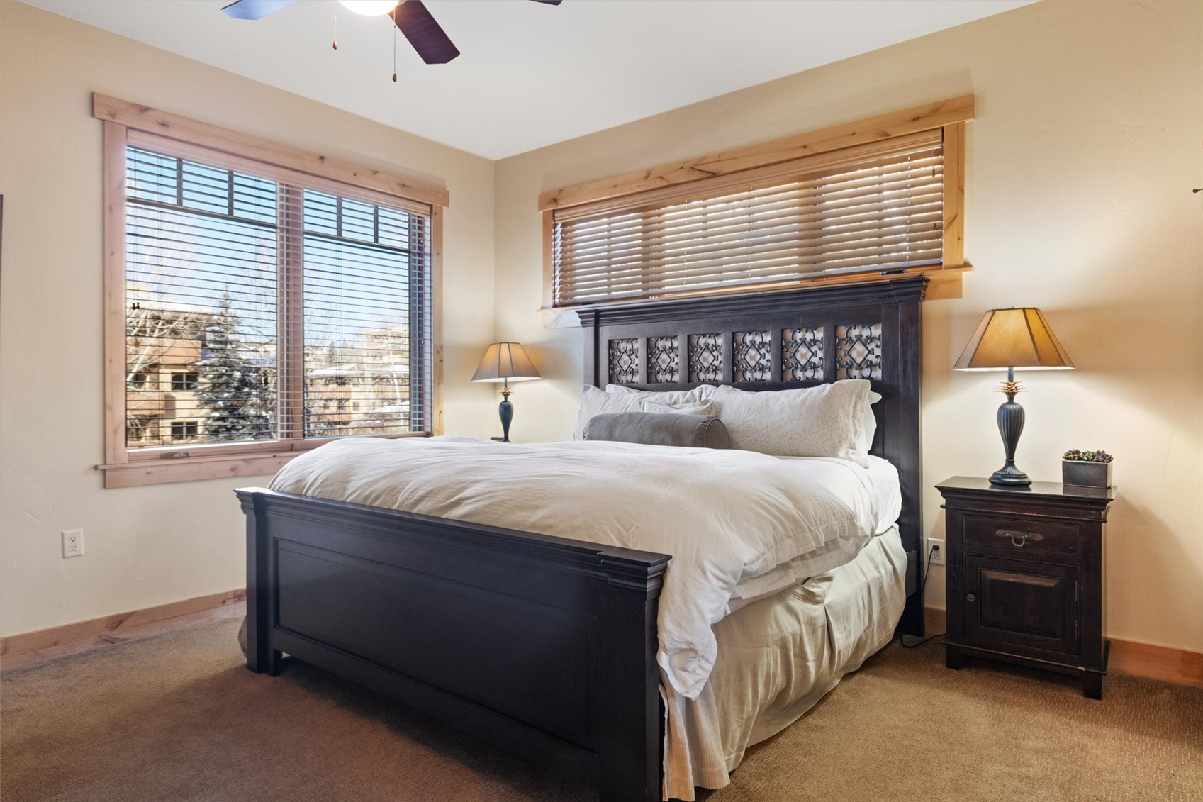 1750 Medicine Springs Road, Unit 6105 Steamboat Springs, CO 80487 - Photo 11 of 43 a bed sitting in a bedroom next to a window