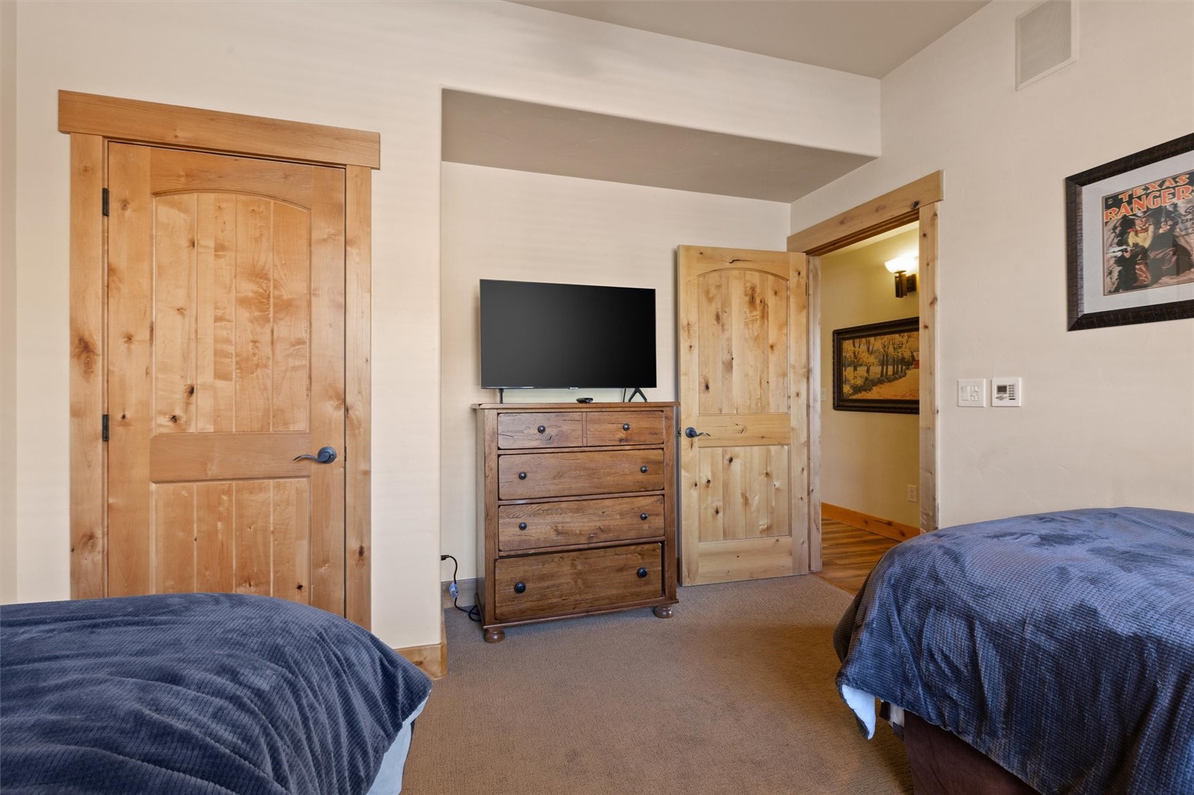 1750 Medicine Springs Road, Unit 6105 Steamboat Springs, CO 80487 - Photo 16 of 43 a bedroom with a bed and furniture