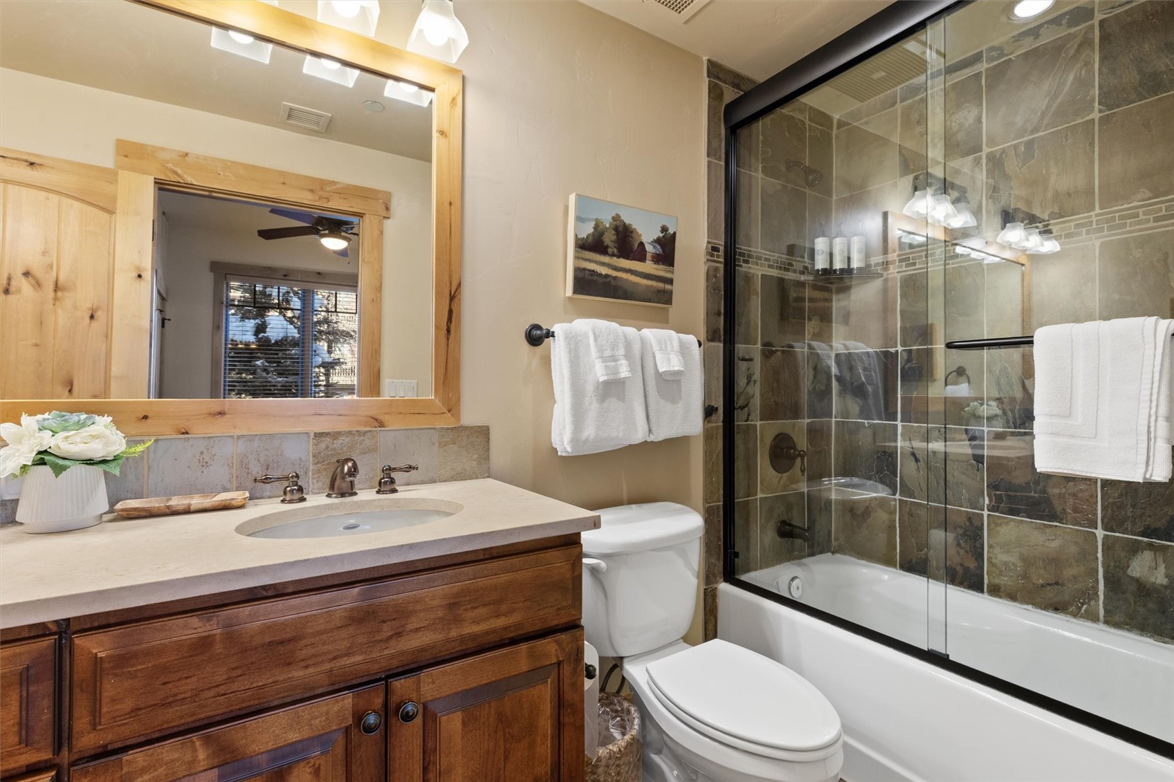 1750 Medicine Springs Road, Unit 6105 Steamboat Springs, CO 80487 - Photo 24 of 43 a bathroom with a sink a toilet and shower