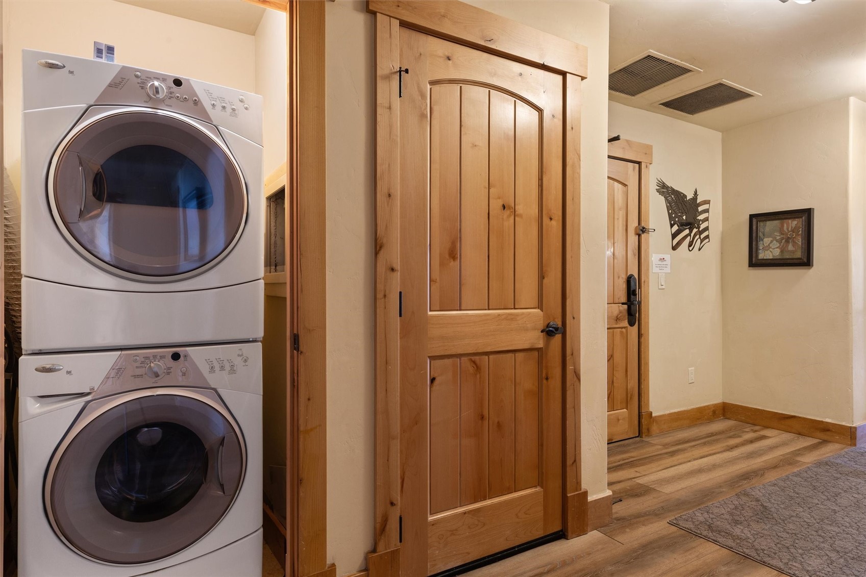 1750 Medicine Springs Road, Unit 6105 Steamboat Springs, CO 80487 - Photo 31 of 43 a view of a hallway with washer and dryer