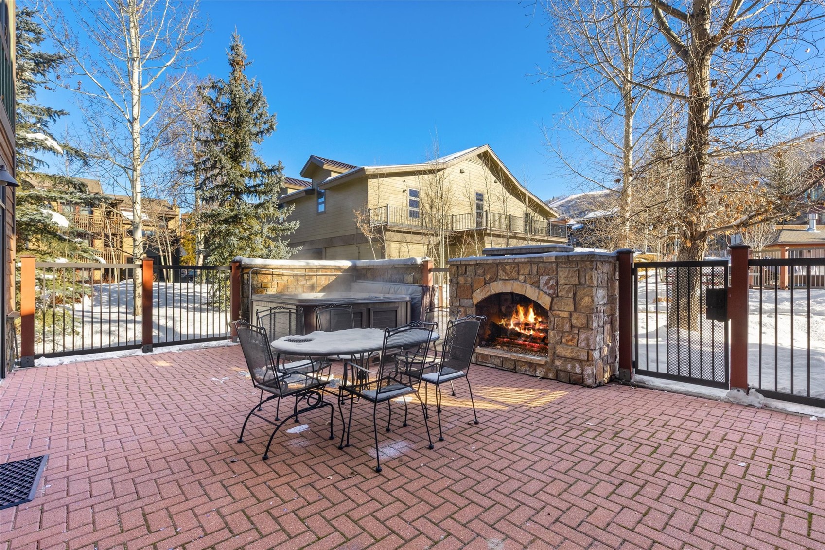 1750 Medicine Springs Road, Unit 6105 Steamboat Springs, CO 80487 - Photo 5 of 43 a view of a patio with a table and chairs