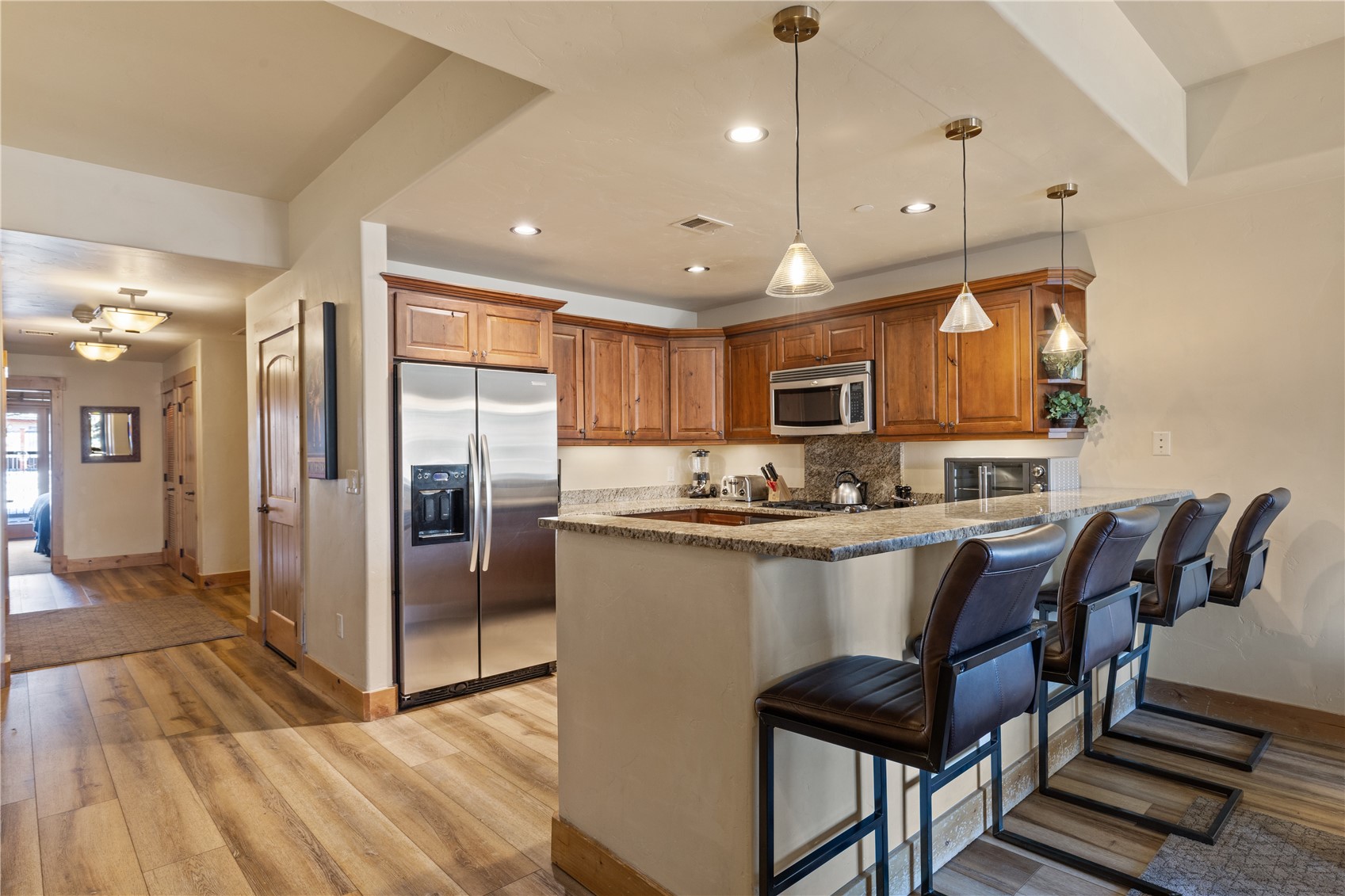 1750 Medicine Springs Road, Unit 6105 Steamboat Springs, CO 80487 - Photo 6 of 43 a kitchen with counter space cabinets and appliances