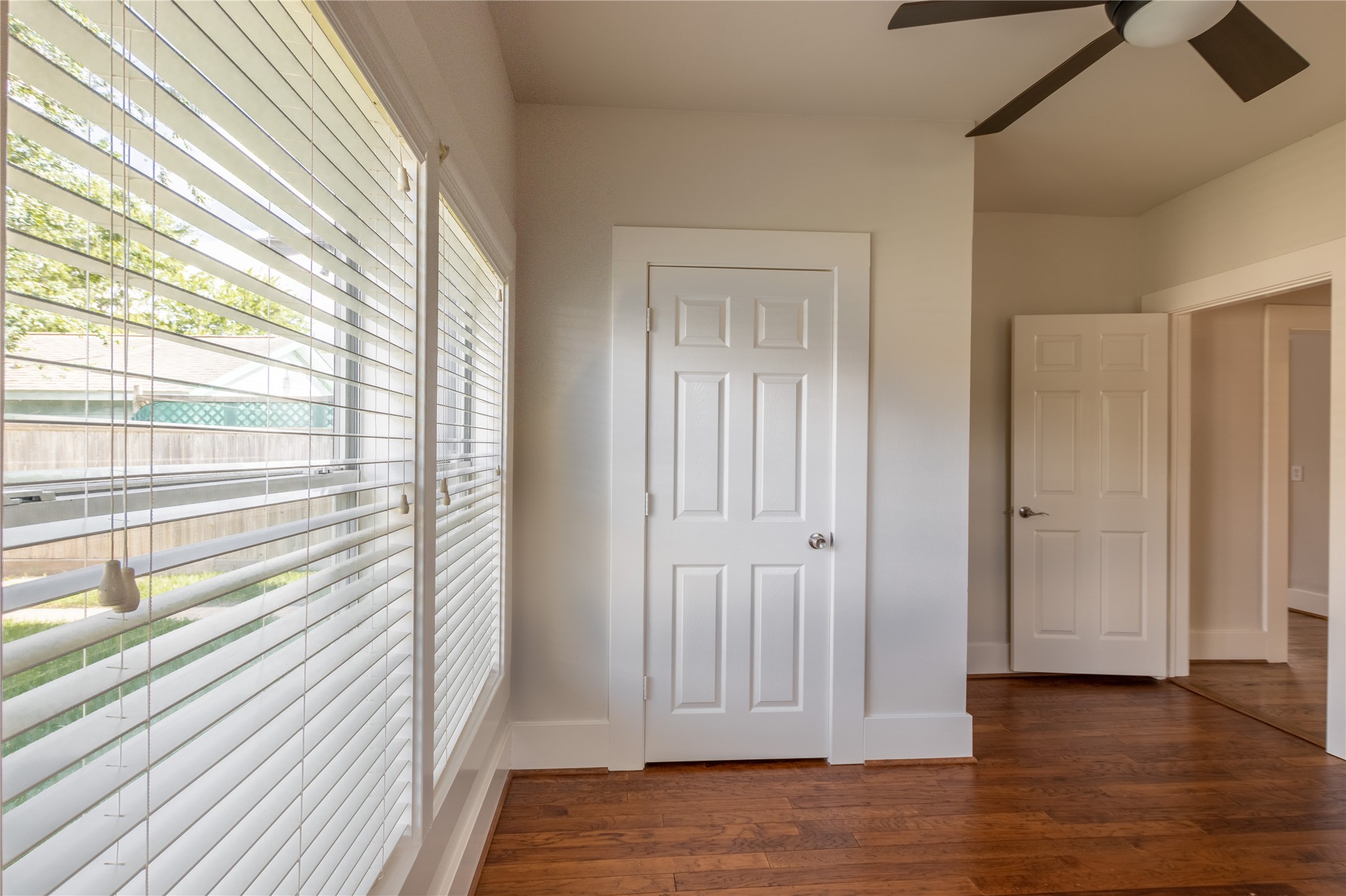 2009 Singleton Street Houston, TX 77008 - Photo 19 of 24 a view of empty room with wooden floor and fan