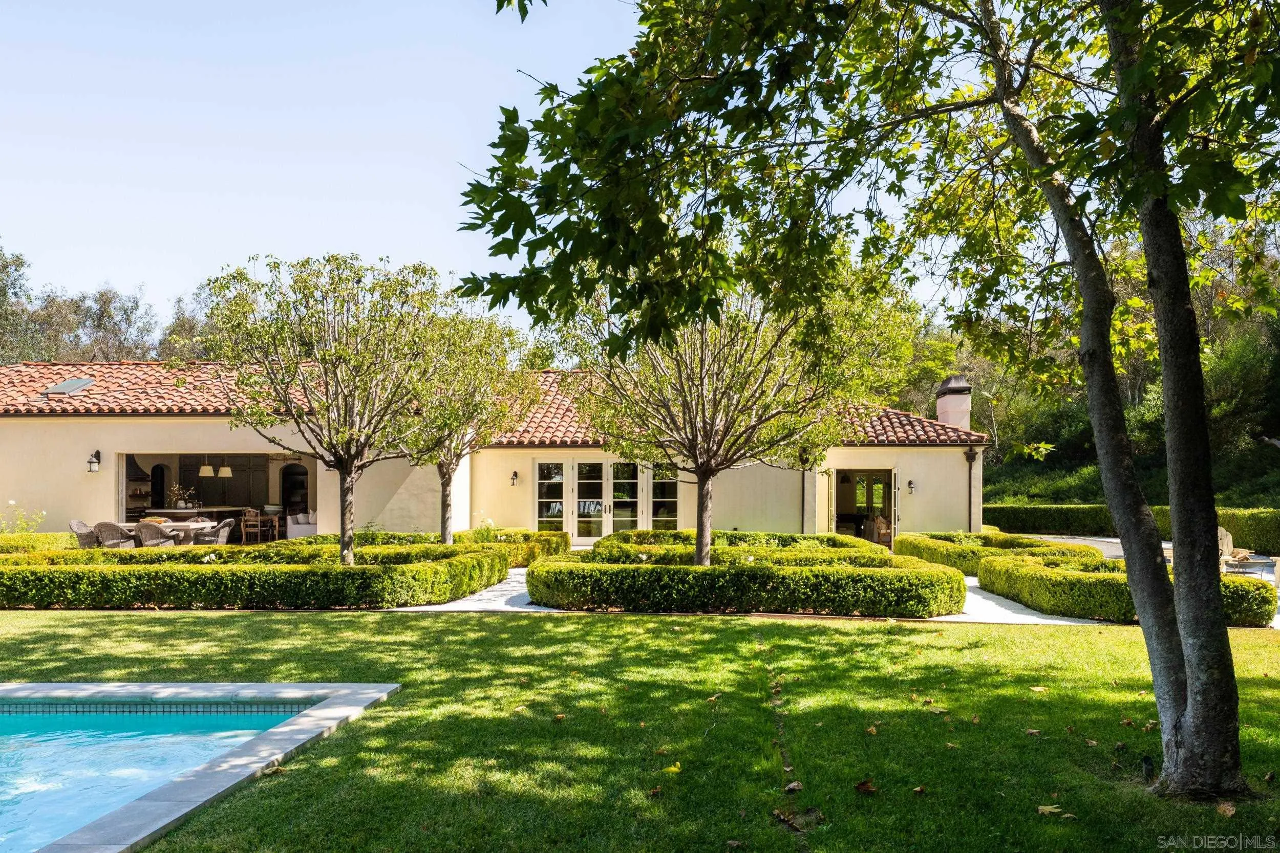 5406 Calzada Del Bosque Rancho Santa Fe, CA 92067 - Photo 19 of 30 a front view of house with yard and green space
