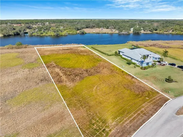 a view of an ocean and city