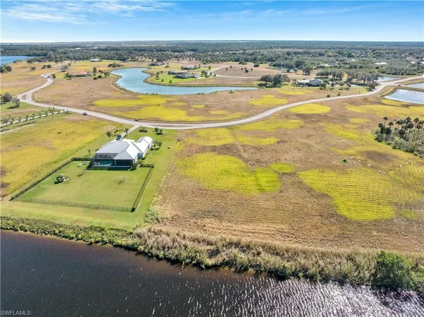 a view of a swimming pool with an ocean view