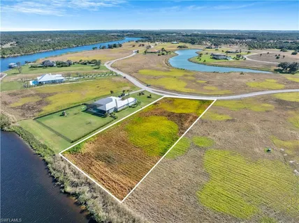 a view of a swimming pool with an ocean view
