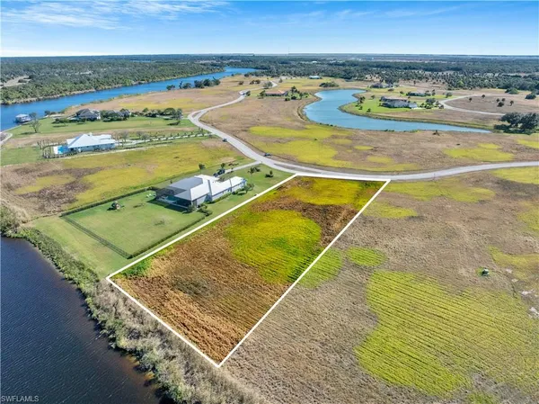 a view of a swimming pool with an ocean view