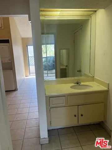 an empty room with a bench