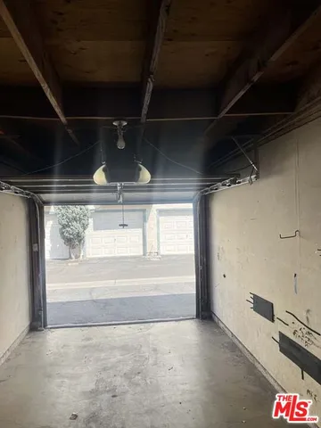 a view of an empty room with a fireplace